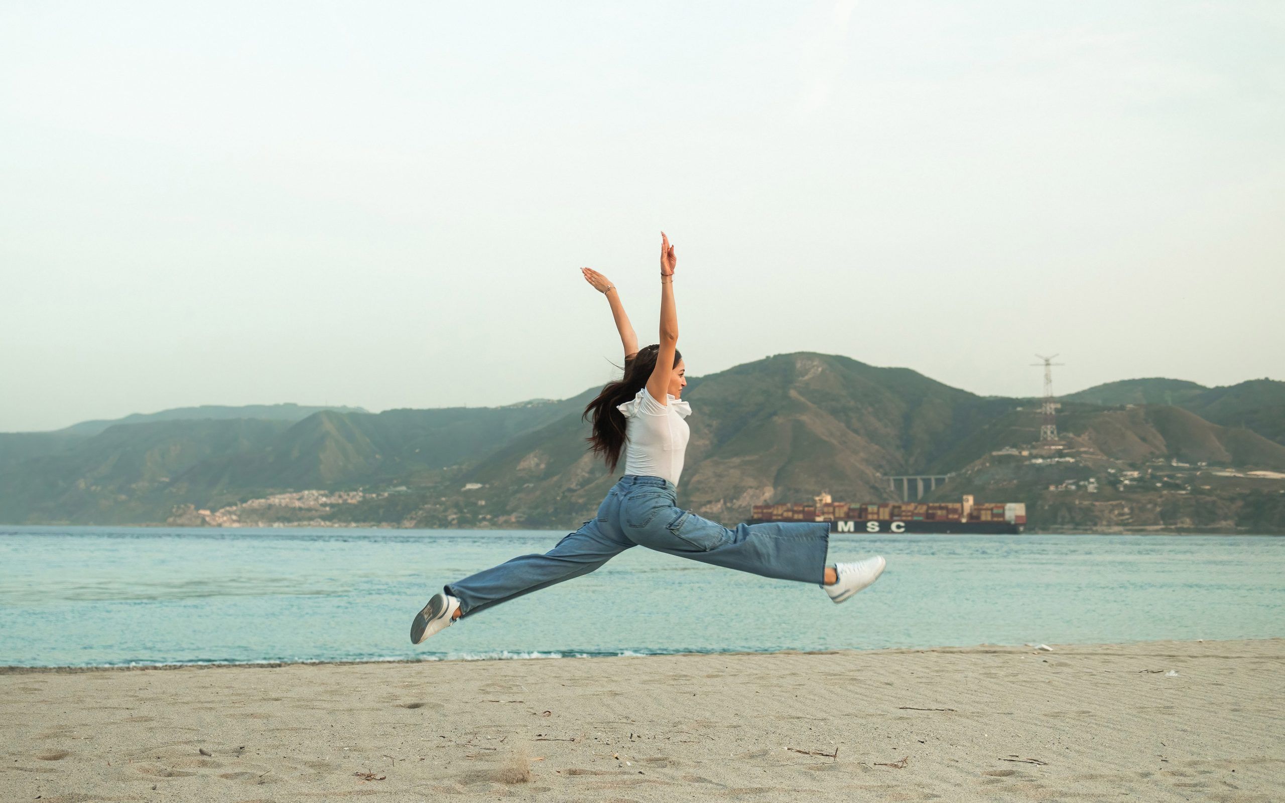 Girl Jumping on beach
